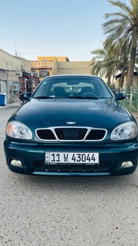 دايو لانوس موديل 2000 رقم بغداد أنكليزي هزة جديدة بأسمي  مصبوغة عام كي...
