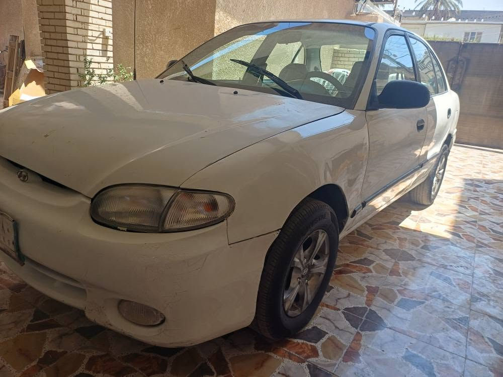 هونداي اكسل موديل 1998 رقم بغداد مميز للاتصال *********** تبريد ثلج محرك كير حداديه جدد سياره جاهزه بيه صبغ عام  تحمل رقم مميز ١٩٨٨٠ بغداد  تحويل ثاني يوم العنوان بغداد حي الجامعه السعر ٣٧ سيارة جاهزه وتري وين تريد مع تبريد ثلج بغداد, العراق
