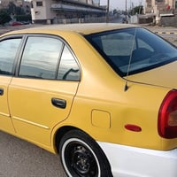 اكسنت فيرنا • ٢٠٠١ • رقم بغداد