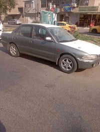 سيارة بروتون موديل 2005 اوتوماتيك ، تبريد شغال ، شاشة وكاميرا خلفية شغ...