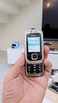 نوكيا • نظيف • بطارية وشاحن