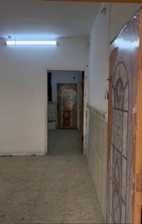 النجف حي القادسية • ٨٠م • طابق ونص