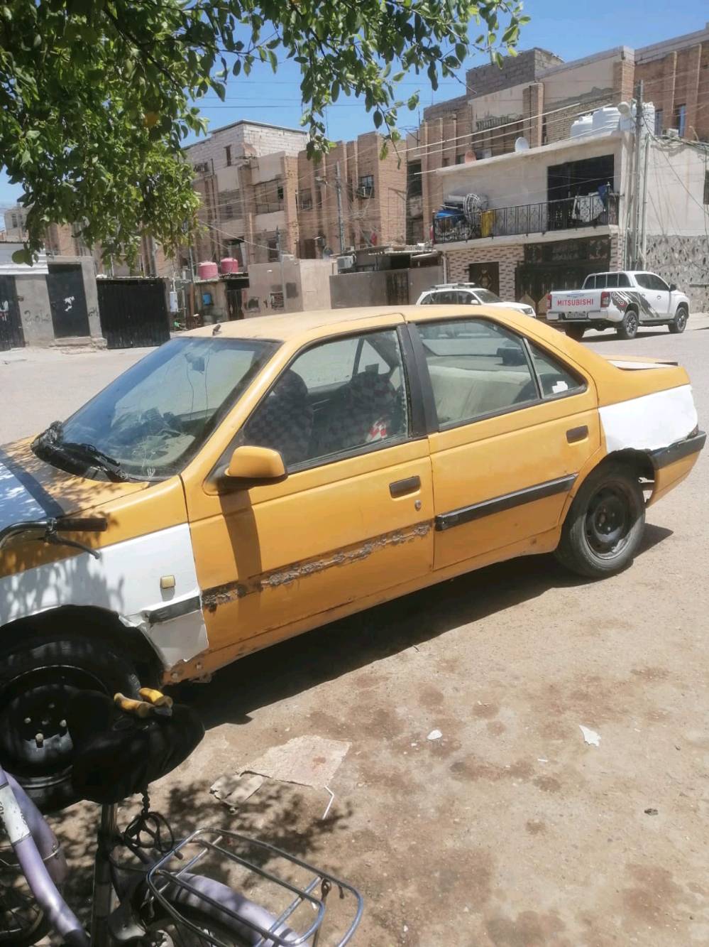 بيجو 405 للبيع بأسمي السعر 15 ورقه ما عليها غرامات هيئه مطلوبه كم شهر متكفل بالتصفير رقم أ  مشروع وطني بصره