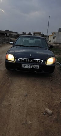 سوناتا منغولي 2001 سيارة نضيفة جداً مال جناي للأستفسار 07812283039