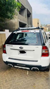 سبورتج 2009 وارد كوري   3 قطع صبغ جاملغ و باب عكس السايق و صندوك بدون ...