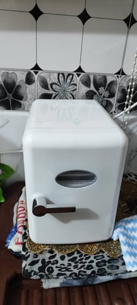 ثلاجة • نظامين • تشغل عالسيارة