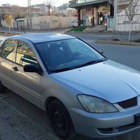 میتسوبۆشی لانسەر 2010 مەکینە گەورە  چوار جام کارەبایی  بێ مەسرەف سەنەو...