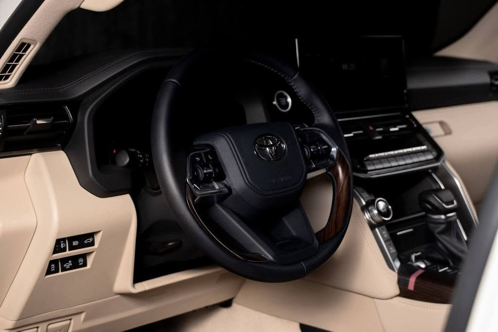 Toyota Land Cruiser GXR 2026 Twin Turbo
للتفاصيل الاتصال على أ. محمد فتحي 
01224774546📞
Power & Performance
Engine: 3.5L V6 Twin Turbo
Horsepower: 409 hp @ 5200 rpm
Torque: 650 Nm @ 3600 rpm
Transmission: 10-Speed Automatic
Drivetrain: Full-Time 4WD
Overall Length: 5145 mm
Overall Width: 1980 mm
Overall Height: 1890 mm
Gross Vehicle Weight: 3230 kg
Fuel Tank Capacity: 110 Liters
Fuel Efficiency: 9.3 km/L
Seating Capacity: 7 Passengers
Number of Doors: 5
Tire Size: 265/55R20
Premium Leather Seats
Ventilated Front & 2nd Row Seats
Power Front Seats with Driver Memory
Power-Folding 3rd Row Seats
4-Zone Automatic Climate Control
Leather and Wood Steering Wheel
Power Tilt & Telescopic Steering with Memory
Wireless Charger
12.3” Navigation Display
11” Rear Seat Entertainment with Bluetooth
JBL Sound System with 14 Speakers
Optitron Meter with 7” Multi-Information Display
Heads-Up Display (HUD)
Keyless Entry
Remote Engine Start
Tonneau Cover
Front, Side, Curtain & Knee Airbags
Adaptive Cruise Control (Dynamic Radar)
Blind Spot Monitor
Pre-Collision System (PCS)
Lane Departure Alert with Lane Trace Assist
Adaptive High Beam System
360° Camera with Washer
3D Multi-Terrain Monitor
Crawl Control
Parking Support Brake
ABS (Anti-Lock Braking System)
Brake Assist (BA)
Torque-Sensing Limited Slip Differential (LSD)
eCall Emergency System
Adaptive Variable Suspension (AVS)
20” Alloy Wheels
LED Headlights with DRLs & Auto Leveling
LED Fog Lamps
Power Tailgate with Kick Sensor
Power-Retractable Side Mirrors with Chrome Finish & Reverse Auto-Tilt
Front & Rear Aerokit Bumpers
Roof Rails
Rear Spoiler
Sunroof
Headlamp Cleaners القاهرة, مصر


**إذا كنت صاحب هذا الإعلان وتريد حذفه لأي سبب، رجاءا أرسل رسالة إلى الدعم الفني**