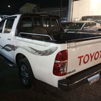 بيك اب تويوتا 2013 بغداد وارد سعودي گير عادي داخل احمر بدون صبغ ولا ضر...