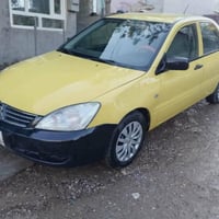 ئەم لانسەرە بۆ فرۆشتن 2010 بە شەرتی بێ عەیبی جوار تایەی تازە باتری تاز...