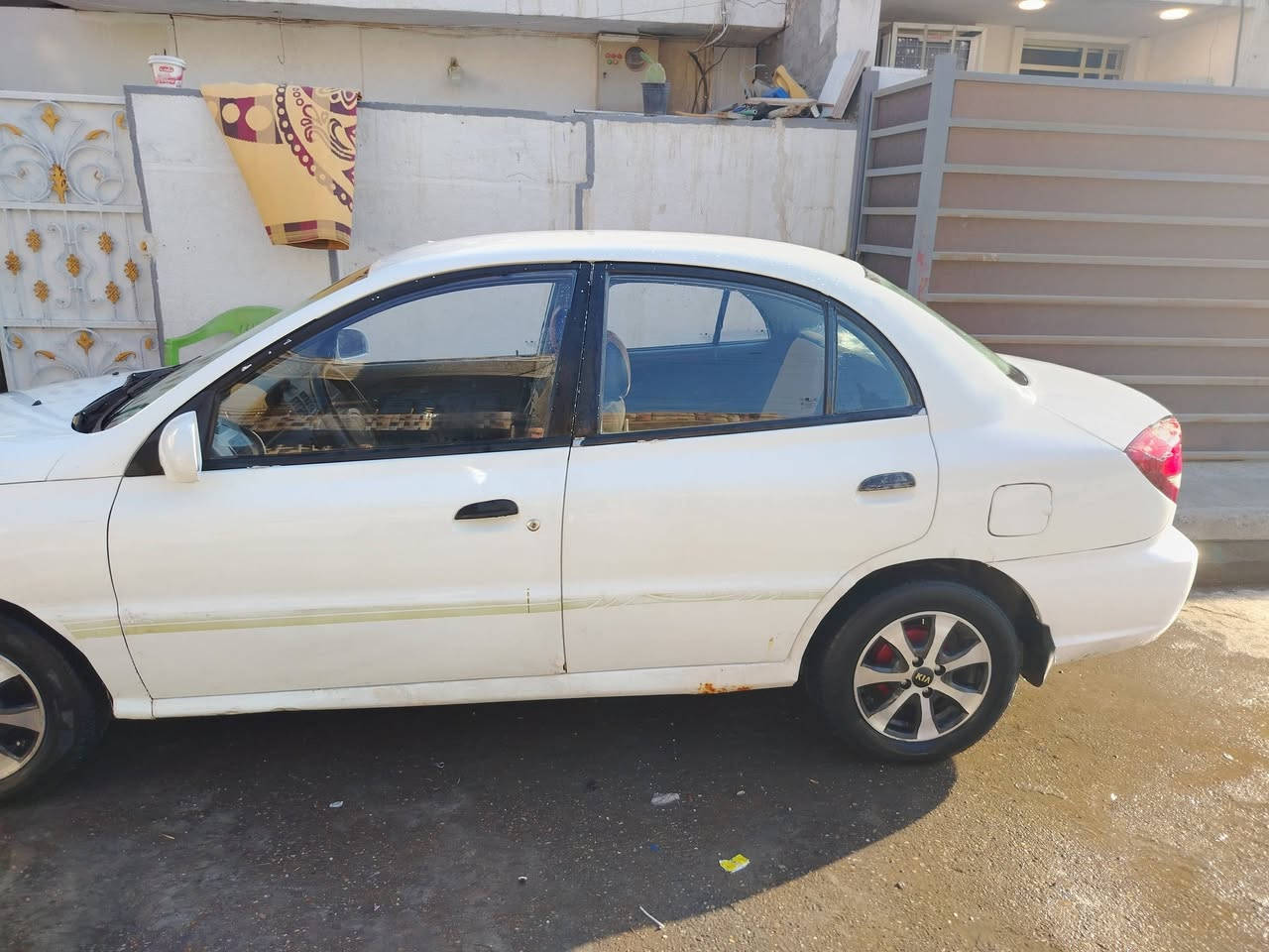 كيا ريو 2003 كير اوتو محرك مفتوح تبريد شغال رقم بغداد شرط التحويل مكان بغداد سعر 45 بيه مجال  رقم الهاتف ***********+9647716336729
