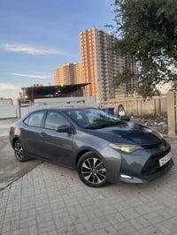 كورلا 2017 Le ماشيه194ميل محرك18 ضررها موجود بالصور  السعر117 07737334...