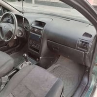 وبركاته للبيع اوبل استرا 2002  انكليزي وبسمي كير ومحرك مكفول تخم تاير ...