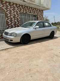 كيا أوبتما موديل 2000 رقم بغداد نكليزي سنويه مجدده لل 2030 هزه بعدها م...