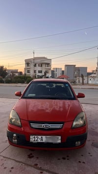 كيا ريو امريكي 2009 توماتيك مكينه16 كير بشرط تدفئه تبريد شرط رقم نينوئ...