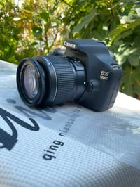 كانون Canon 1200 D  الملحقات   شاحنه  حزام كتف جنطه درع ضد الكسرر  قرص...