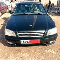 اوبتيما ٢٠٠١ • كير اوتوماتيك • رقم انكليزي