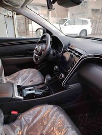 توسان موديل 2022 لون رمادي ماشيه 85 الف *رادارات بل مري  *محرك السيارة...