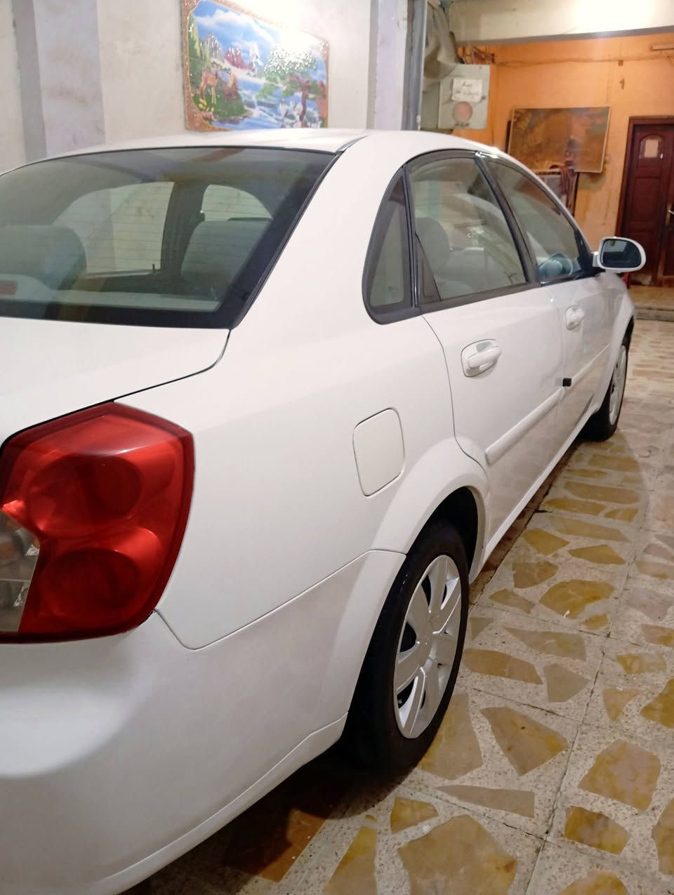 سلام عليكم اوبتره موديل 2011 جديده وجاهزه من كلشي السياره علا وضع الشركه كبات الشركه كاعيات الشركه سويجين كتلوكات الشركه عدة الشركه استلام عله ايد وحده ماشيه 170 رقم ذي قار انكليزي سنويه وهزه جديده السياره مكفوله من الضربه والصبغ والتبديل ماعدا الي ماشر عليهن فقط السياره جديده مكينه كير حداديه تبريد تخم تاير باتري جديد جاهزه للأخير السعر 88 مكان السياره الناصريه الحبوبي للاتصال ***********
