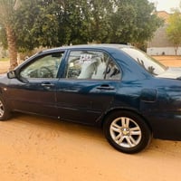 لانسر ٢٠١٠ • تكييف • كمبيوتر