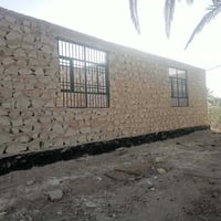 النجف الاشرف • بناء حجر • سياجات ورصف