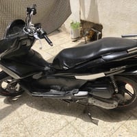 Pcx الجيل الاول  دراجة مرتبة ونضيفة كهربائيات شغالة كفراتهة يرادلهن تر...