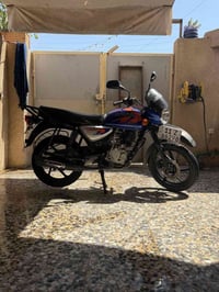 دراجه بوكسر موديل 23 مكفوله كفاله عامه رقم بغداد انكليزي  ب اسمي شخصيا...