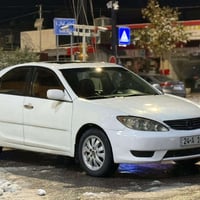 للبيع: تويوتا كامري 2004 وارد أمريكي 🚗 الموديل: 2004 🎨 اللون: أبيض 🌍 ا...