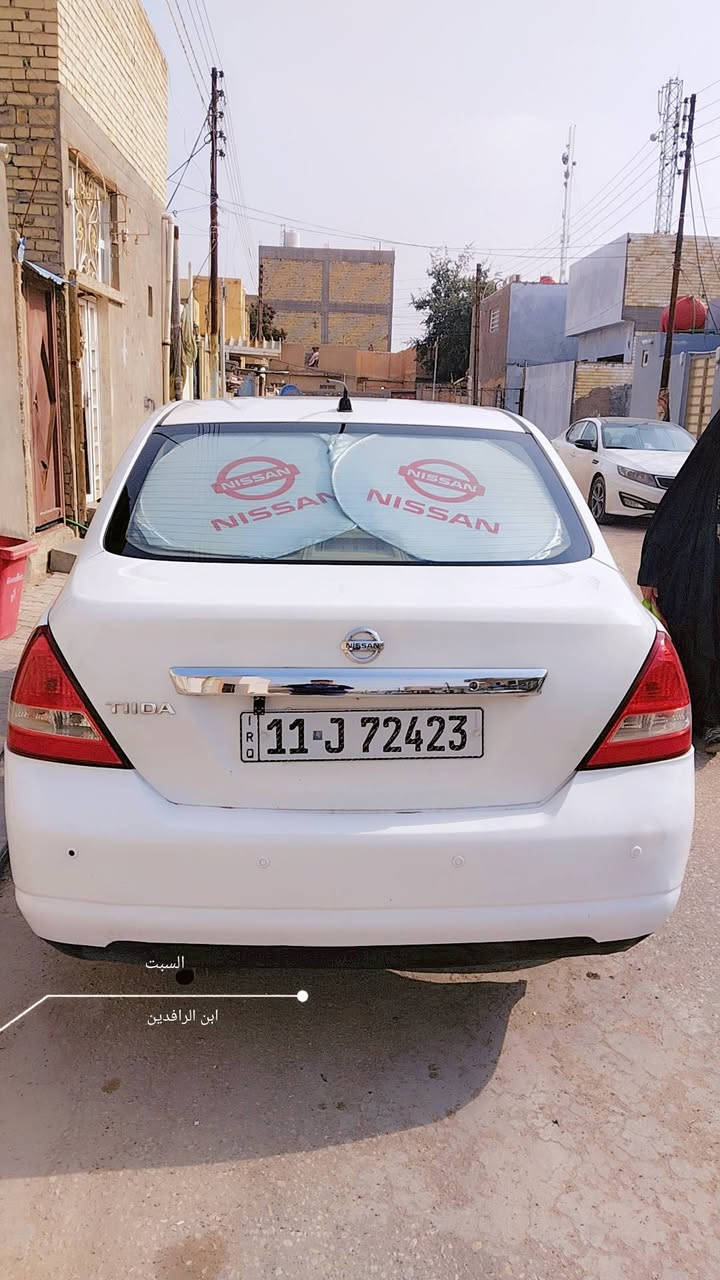 نيسان تيدا ياباني اصل 
رقمه انكليزي بغداد بأسمي
٢٠٠٧ وارد خليجي
غرفته عسلي شاشه وكامره 
تبريد ثلج منظومه جديده محرك جديد
كير فقط البگ يأخر شويه
كهربائيات كله بلادي وشغال
حداديه نص عمر
تخم تاير وباتري جدد
ارضيه جلد منظومة لايت جديد شمسي سيارة جاهزه
بيه جاملغ صوب السائق الامامي مصبوغ فقط 
مكاني نجف ***********
