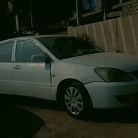 لانسر 2010 بكانه بغداد رقم بغداد تحويل للسفتسار 07705346766