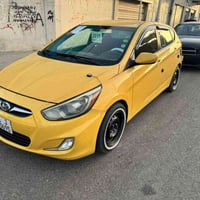 اكسنت مضلع جنط امريكي موديل 2015رقم بغداد اجنبي هيئا وغراما مصفرا محرك...