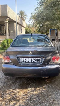 للبيع.... لانسر 2007 رقم اربيل دولي  بيها جراد بسيط السعر 68$ بيها مجا...