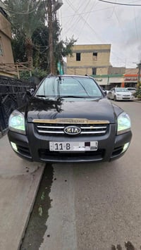 للبيع سبورتج 2007 رقم بغداد باسمي وارد امريكي ضربته  طرف البنيد والجام...