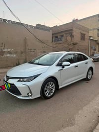 كورلا موديل 2024ساز لون ابيض   رقم اربيل   فتحه / بصمه   حساسات اماميه...