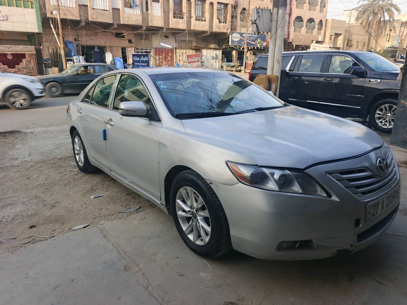 السلام عليكم سيارة كامري بسمي تحويل  الرستميه٢٠٠٩رقم ذي قار انكليزي هزه جديده تخم ويل كب مال ٢٠٢٢تخم تايروباتري جديدغرفه جديده مدوشمه كشنات وارضيه وكاعيه مكينه وكير وتبريد جديد مال حاويه بيها صبغ قطع ابيعلك عام مكاني بغداد حي الامين الثانية ***********