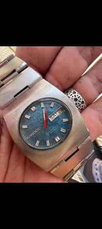 ساعه ساندوز سويسري اصلي فنتج 1965 اوتو  مع نصب نظافته فول مينا فيروزي ...