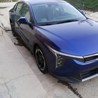 (كيا K4 2025 EX) بدون رقم بأسمي اني المستورد حادثها تبديل چاملغ امامي ...