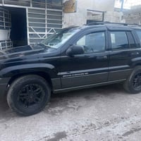 جيب شيروكي موديل 2004 كير محرك بلادي سياره جاهزه دوشمه جديده كشنات كهر...