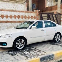 أوبتيما ٢٠١٠ • مكينة ٢٠٠٠ • حالة كارتون