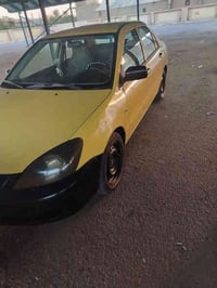 لانسر مديل 10 سيارة تخم تاير  كهربائي شغاله الاستفسار على الرقم 078256...