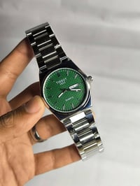 تيسوت • كوارتز • ستانلس ستيل