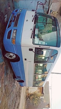 كوستر نيسان 2002 رقم نكليزي مميز غاز بانزين تخم تاير تبريد شغال باب كه...