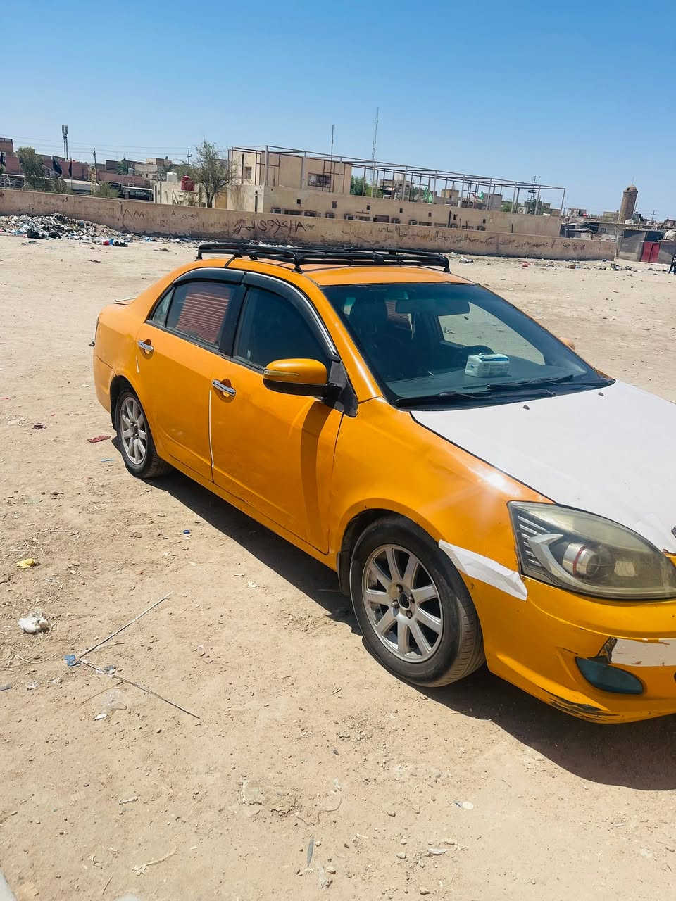 جيلي موبل ٢٠١٢ مكينة كورلة ١٨٠٠ كير عادي توني شادة مال حاوية تبريد ثلج  شاشة كامرة  (اي ضربة مابيهة بيهة خياسات بالتكم ولغود والهلالات معمرات) سيارة بسمي سنوية نتهت صار شهرين مصفرة هئة وغرامات مكاني ناصرية شهداء خلف المركز الصحي ***********.  السعر ٣٣ بيهة شوية مجال
