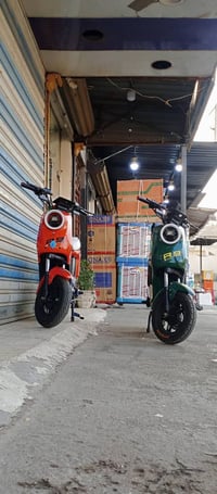 كلمن • دراجة كهربائية