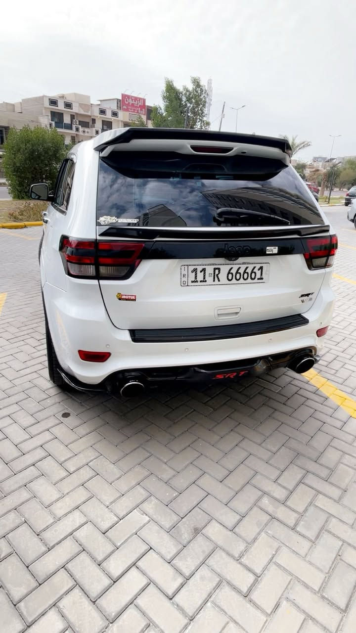 السلام عليكم
للبيع خليجي مكفول 
جيب كراند شيروكي SRT  6400 
الموديل (2013 ) خليجي  فول 
المحرك   6400cc.  srt  V8 
رقم بغداد الجديد مميز  
المواصفات 
دفع رباعي 
كشنات جلد وكنتاره 
المقاعد الأمامية كهرباء
ذاكره لحفظ وضعيات الجلوس 
المقاعد الأمامية تبريد مع التدفئه
المقاعد الخلفية تدفئة
ويل قياس 20 انج 
مقود السائق كهربائي
داخل كربون فايبر 
سقف بانوراما 
شاشه كبيره 
مصابيح الاماميه عدسات ليزر
لدات متغير الاوان ع التليفون 
تشغيل عن بعد 
صندوق كهربائي 
 حساسات اماميه
حساسات خلفيه
مرايا متحسسه للضوء العالي 
رادار 
نظام الصوت 16 سماعه مع دمام خلفي
نظام البريك برمبو 6 بستم وخلفي 4 بستم
عليها شتوته afe مغلقه 
اويل كاج كان 
بلكات ريسنك 
ولف حماوه ريسنك 
دوان بايب تفريغ حجر 
برمجة مصطفى ايكل سيفتي 
دبات خلفيه بورلاه اتاك 
صوت حلو مرتب 
للاستفسار 
***********
غير متواجد ع الفيس 
مكان السيارة بغداد 
حي الجهاد 
السعر 18,500 الف دولار 
وبيها مجال بسيط
