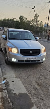 دوج كاليبر مديل2007 رقم بغداد انكليزي  محرك وكير مكفولات  صدر خلفي اما...