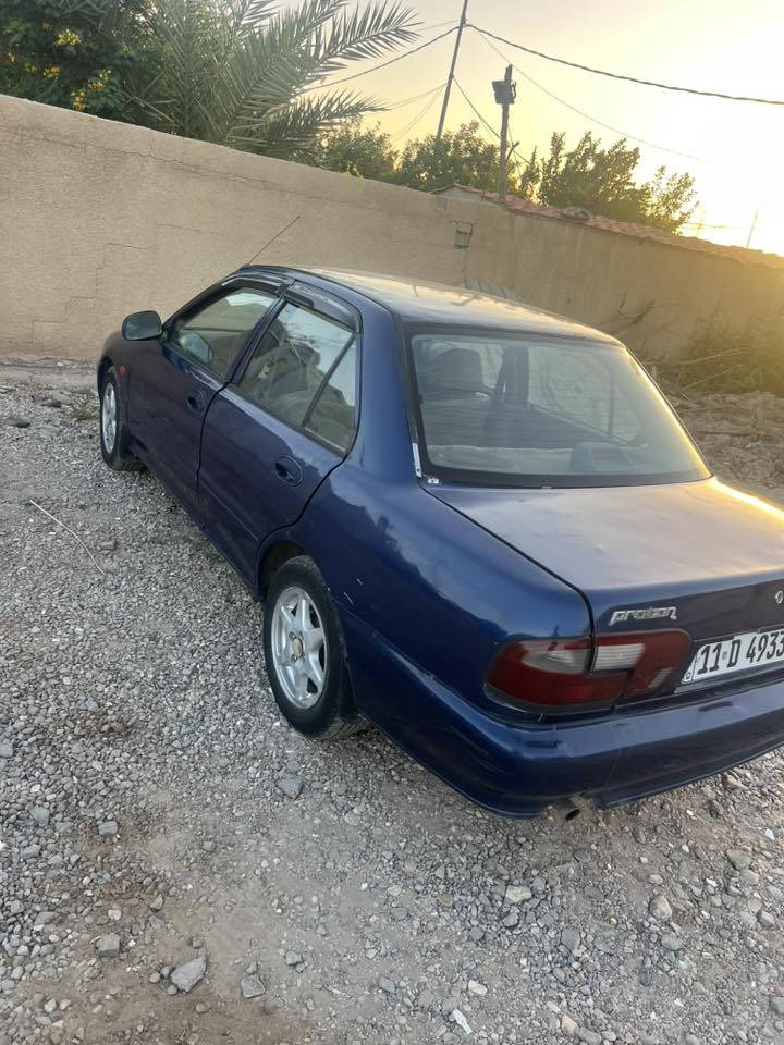 بروتون 
موديل2004 رقم بغداد أب اسمي 
السياره تخم تاير صدر جديد 

مكينه خير من الله 
تبريد شغال 
مصبوغه حزام 
جماليه بدون جراد مكاني واسط الحفريه 
***********
