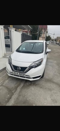 سياره نيسان فيرسا نوت شرط كير ومكينه ورقم جديد 07705125385