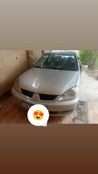 لانسر ٢٠٠٨ • بدون حادث • تاير جديد