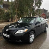 تويوتا كامري 2009  اسود ملكي سيارة نظيفة ومدامة كشنات جلد تبديل جاملغ ...